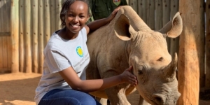 Smithsonian researcher with a rhinoceros